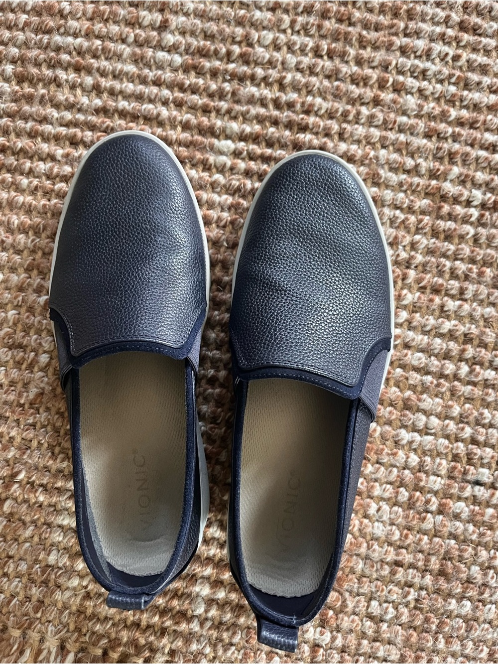 VIONIC navy slip-on sneaker, size 8.5, runs large.